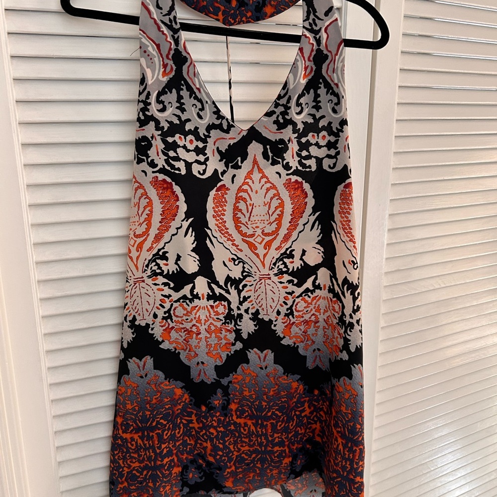 Elegant Patterned Mini Dress by Tyche